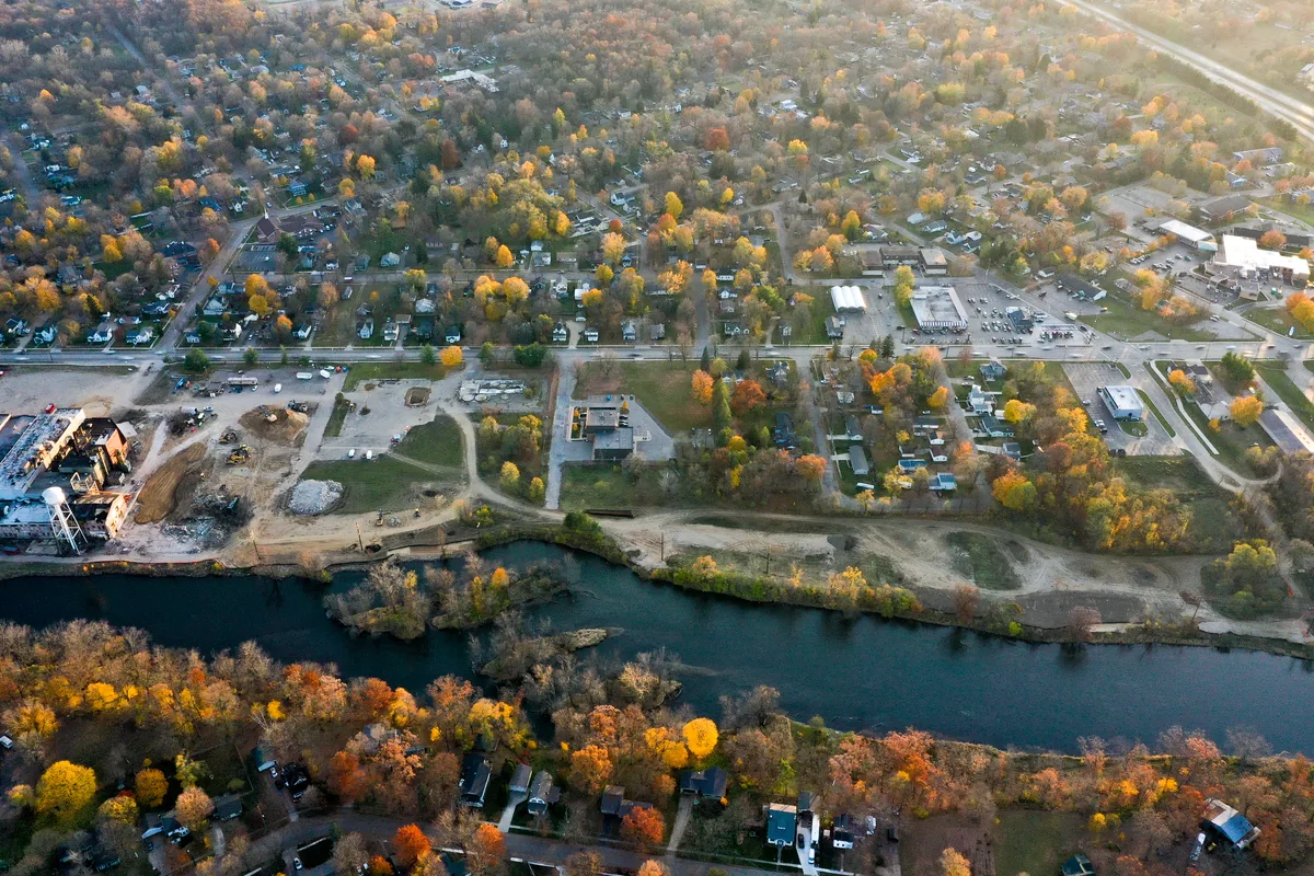 Drone view of the mill site, the Kalamazoo River and Plainwell in fall