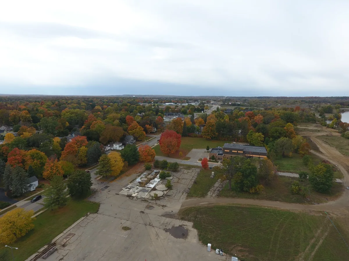 Fall drone view over cleared land on the mill property