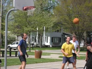People playing basketball at the Sherwood Park courts